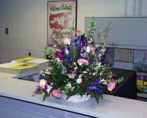 Spring arrangement of flowers on a counter.