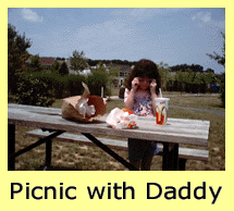 Miranda at a picnic table.